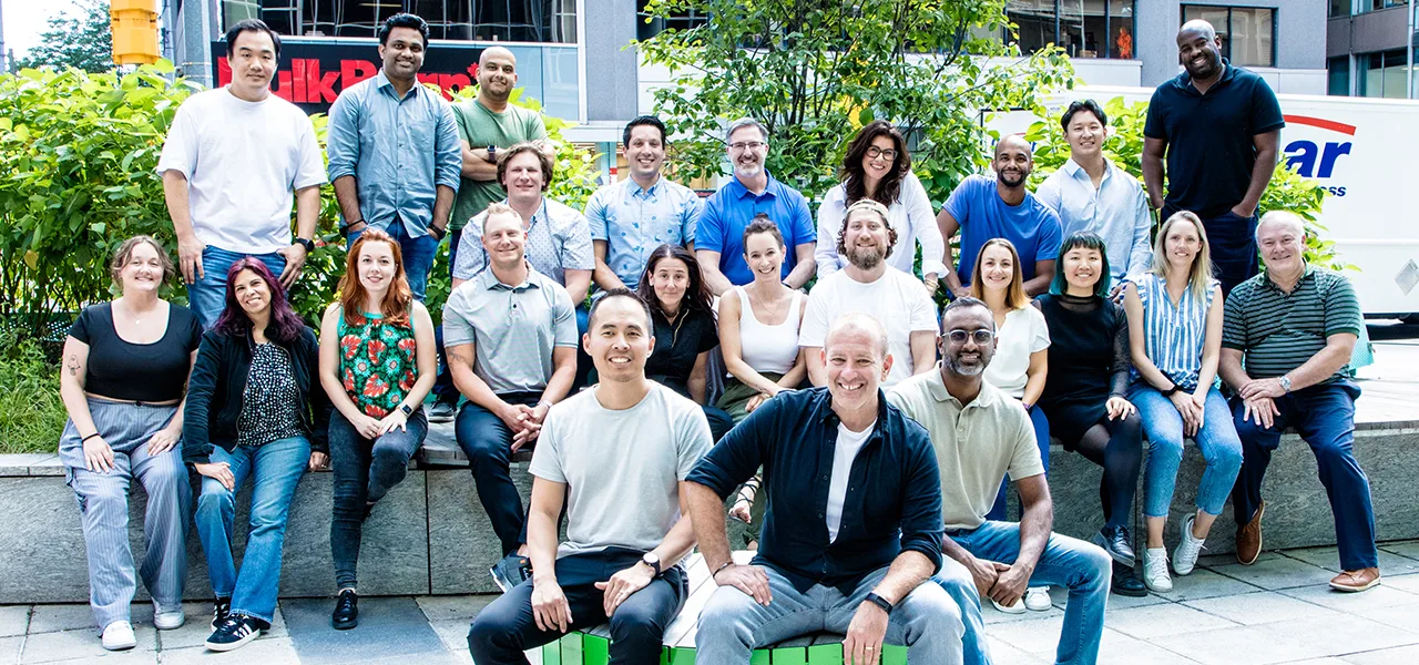 Group photo of the HONK team in an outdoor urban setting